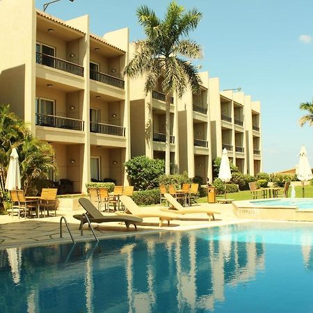 Panacea Suites Hotel Borg El Arab Bagian luar foto