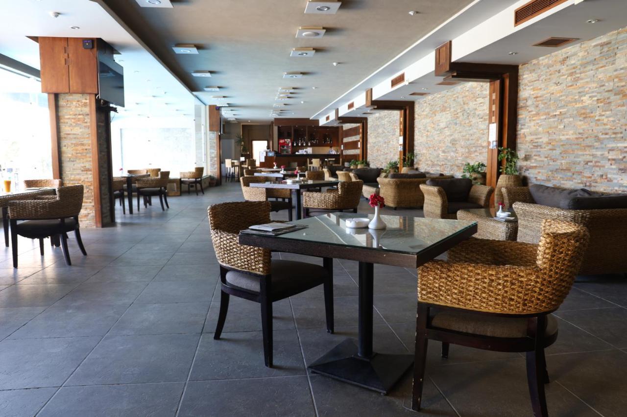 Panacea Suites Hotel Borg El Arab Bagian luar foto