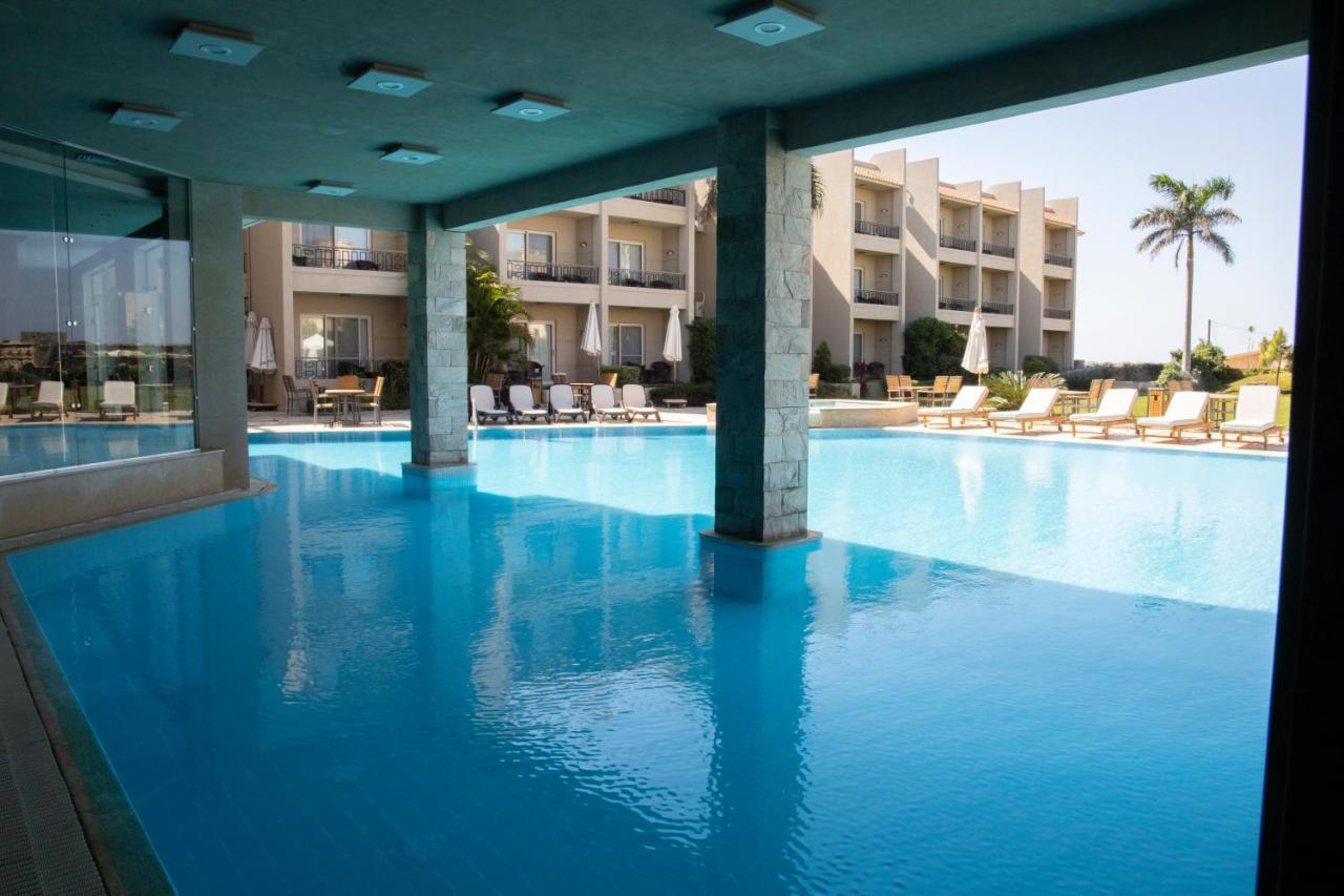 Panacea Suites Hotel Borg El Arab Bagian luar foto