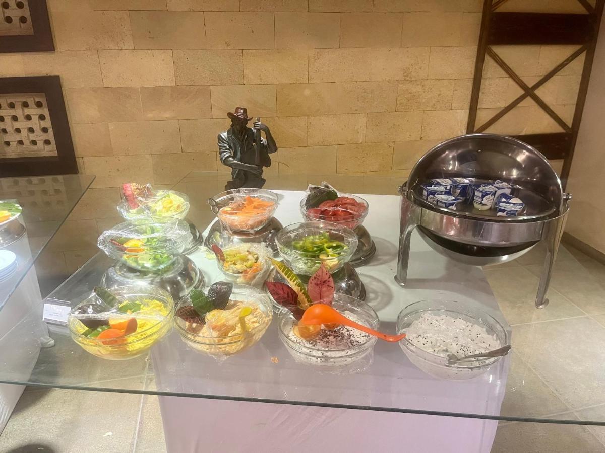 Panacea Suites Hotel Borg El Arab Bagian luar foto