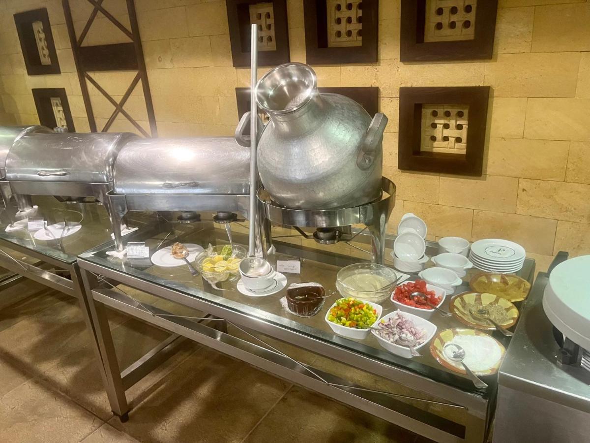 Panacea Suites Hotel Borg El Arab Bagian luar foto