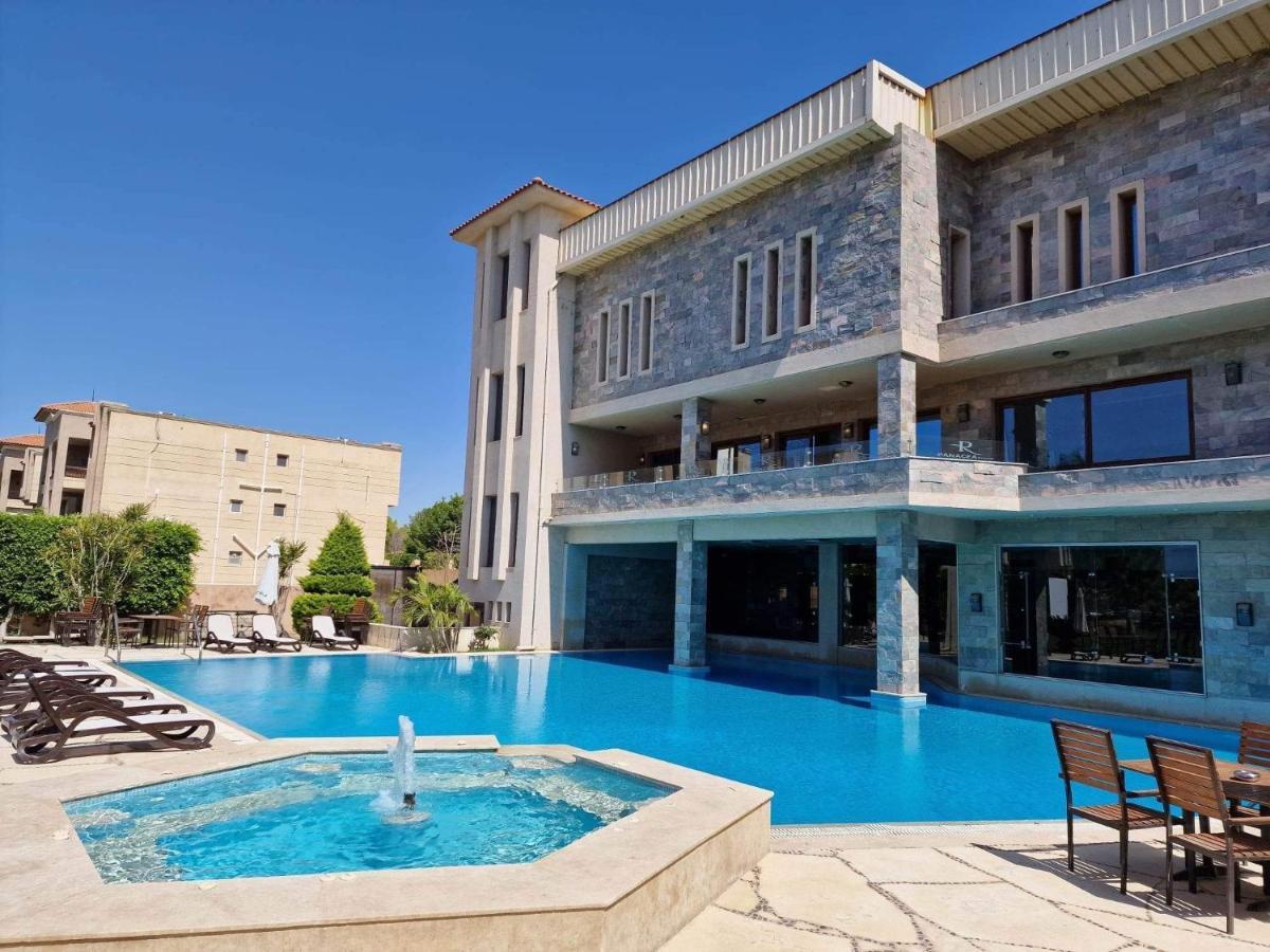 Panacea Suites Hotel Borg El Arab Bagian luar foto