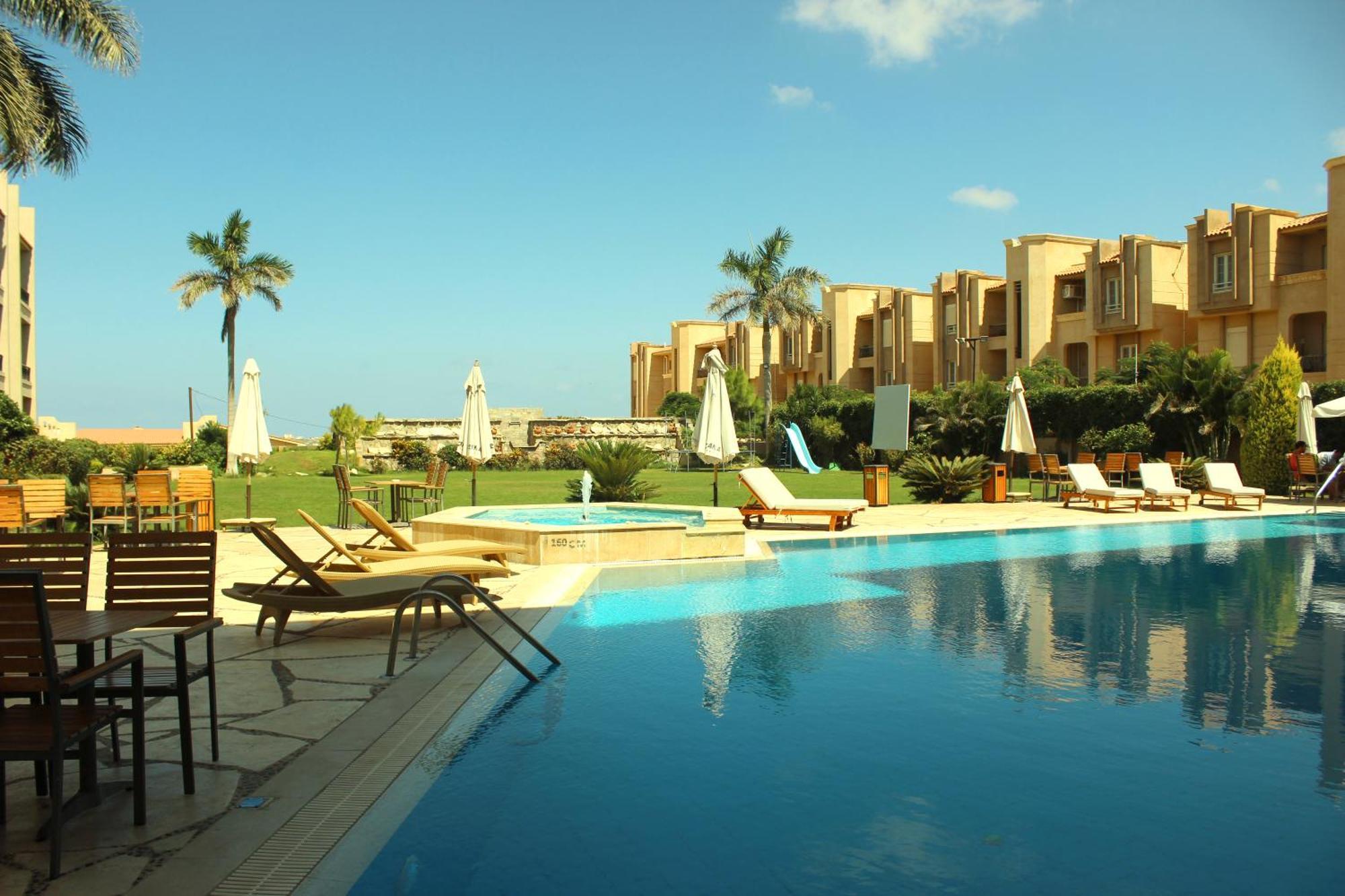 Panacea Suites Hotel Borg El Arab Bagian luar foto