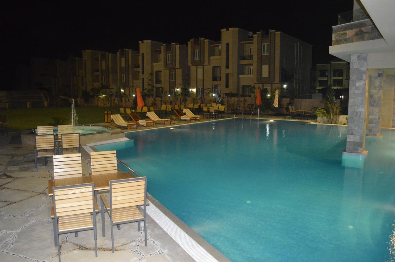 Panacea Suites Hotel Borg El Arab Bagian luar foto