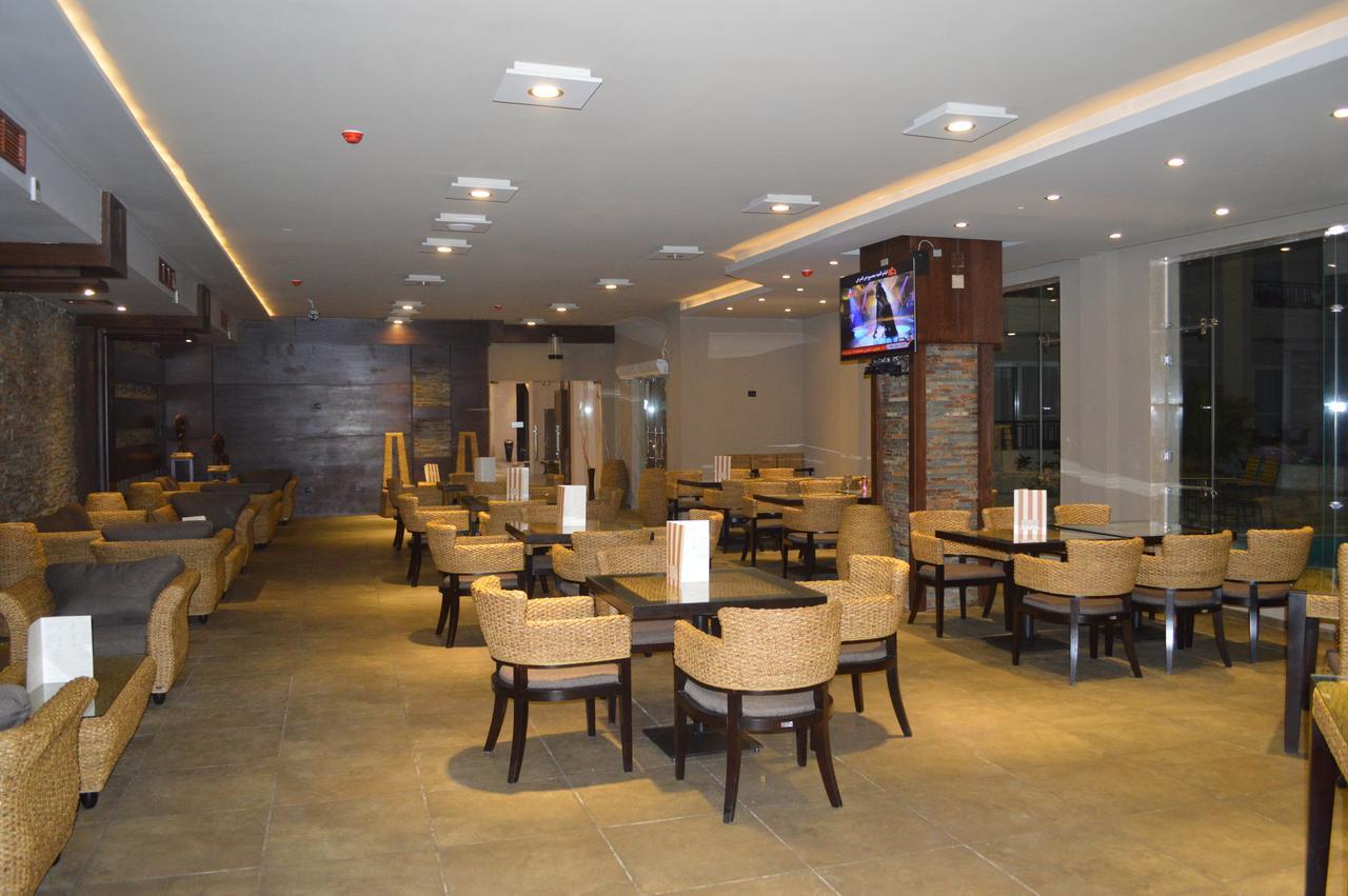 Panacea Suites Hotel Borg El Arab Bagian luar foto