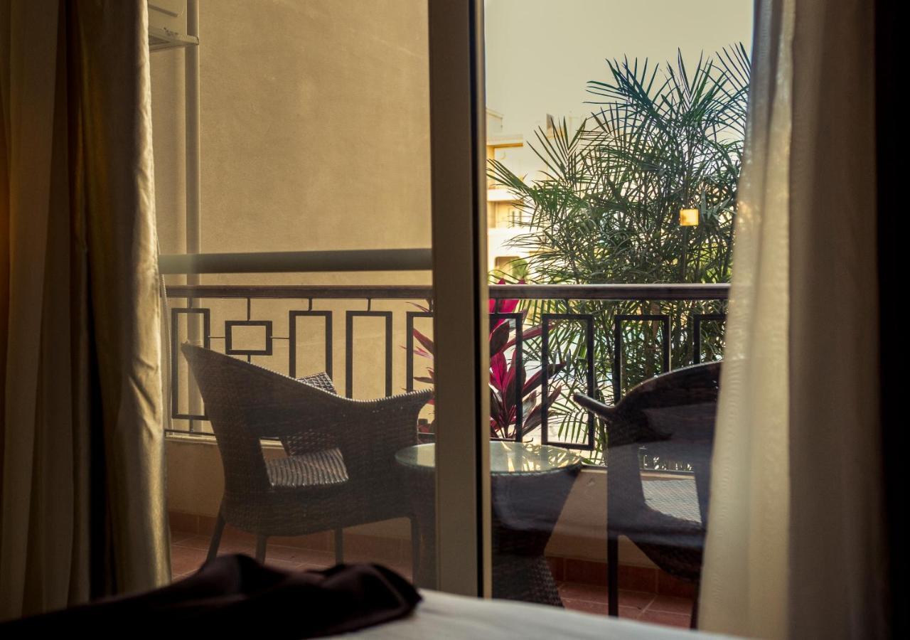 Panacea Suites Hotel Borg El Arab Bagian luar foto