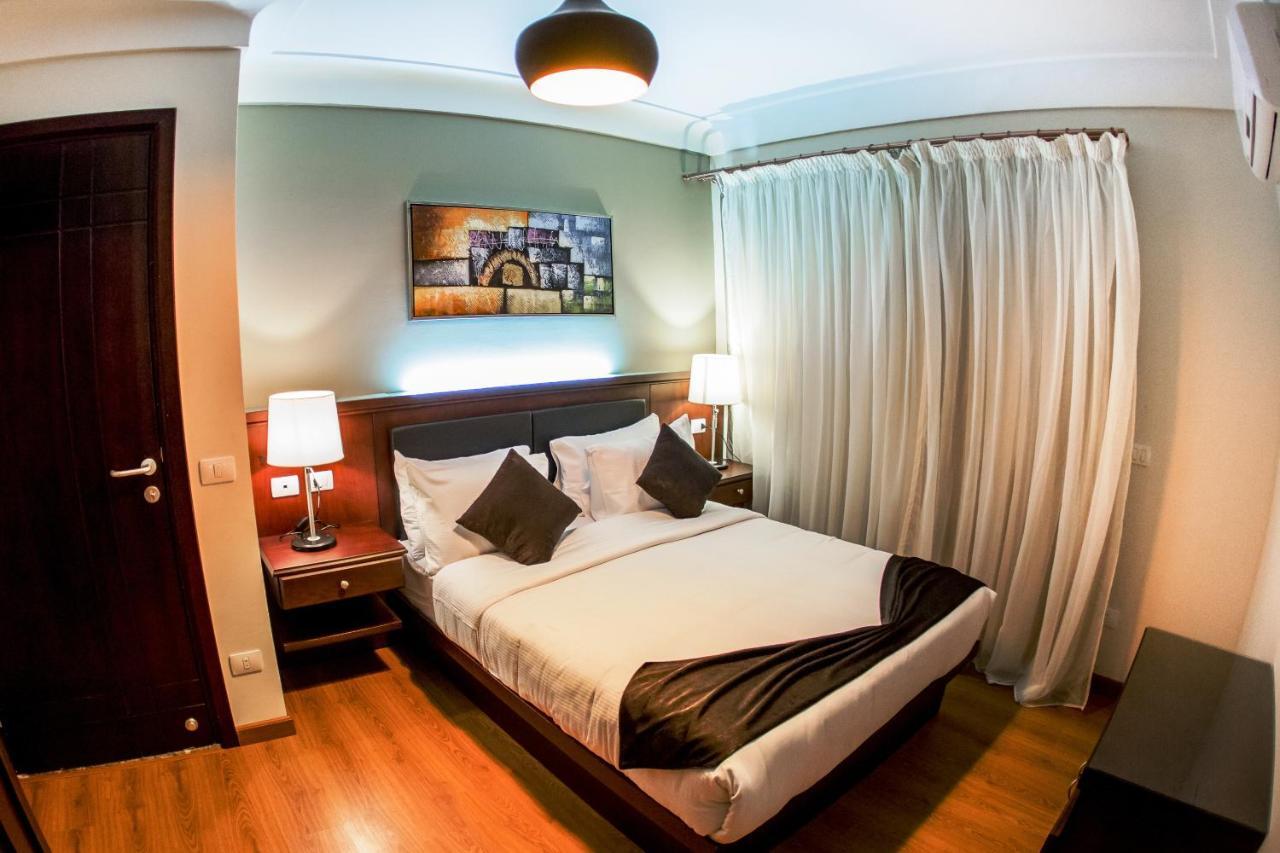 Panacea Suites Hotel Borg El Arab Bagian luar foto