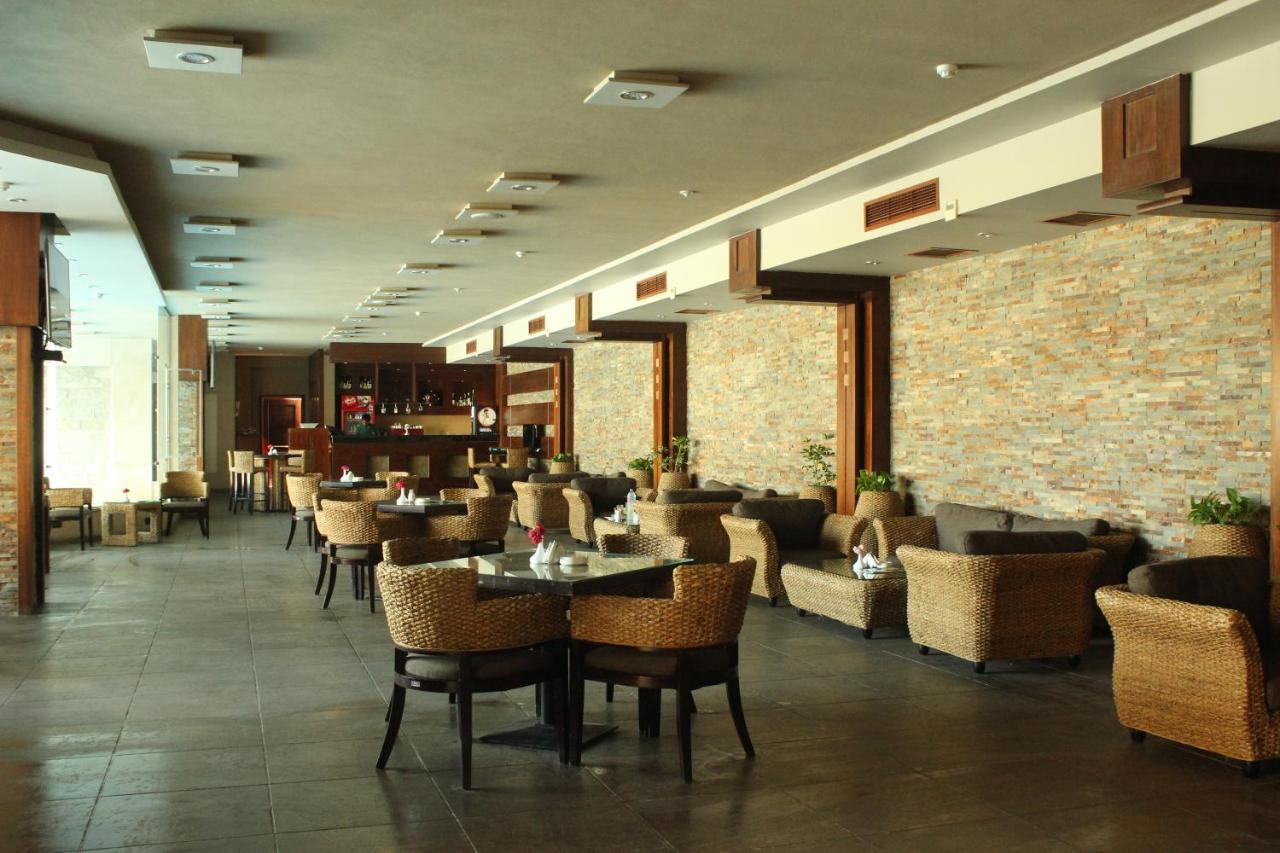 Panacea Suites Hotel Borg El Arab Bagian luar foto